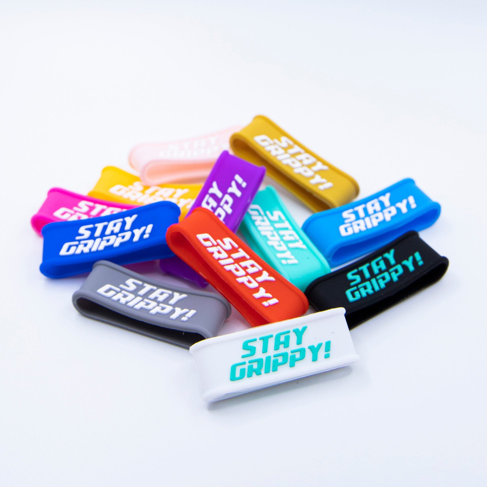 Colorful 'Stay Grippy!' bands on a white background