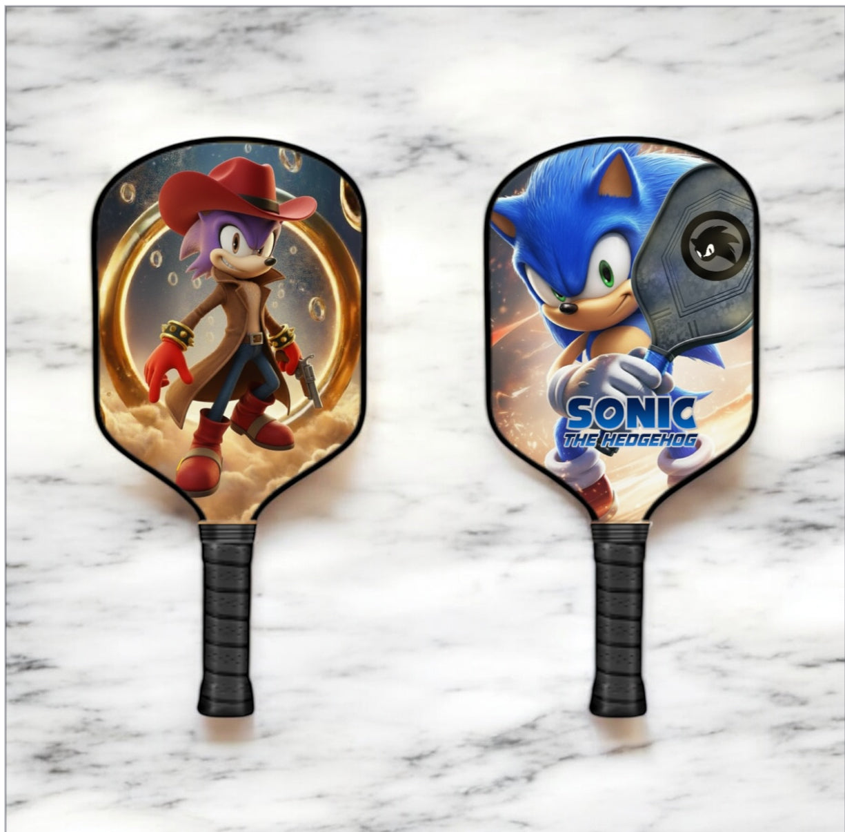 Two pickleball paddles with Sonic the Hedgehog design on a marble surface