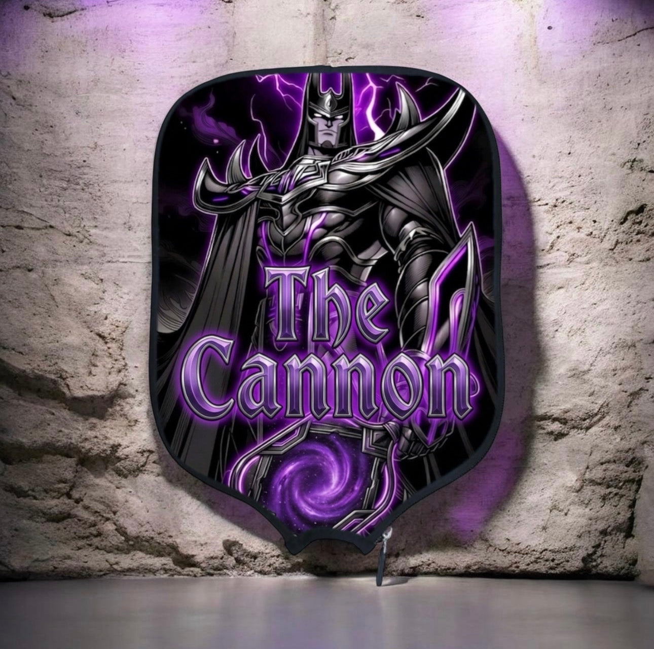 Decorative wall piece with a superhero design and 'The Cannon' text on a stone wall background