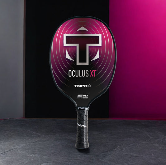 Pickleball paddle with 'Oculus XT' branding against a dark background