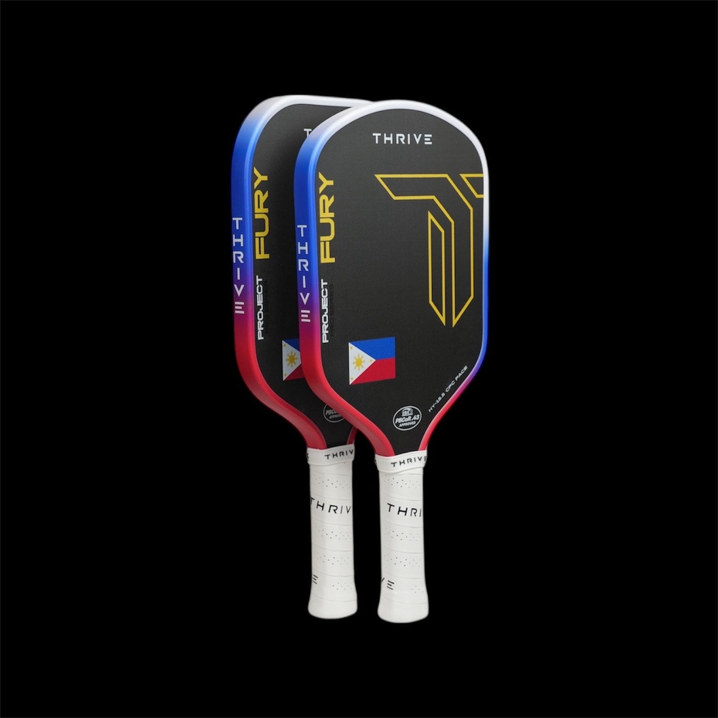 Two pickleball paddles with 'Fury' and 'Thrive' branding on a black background