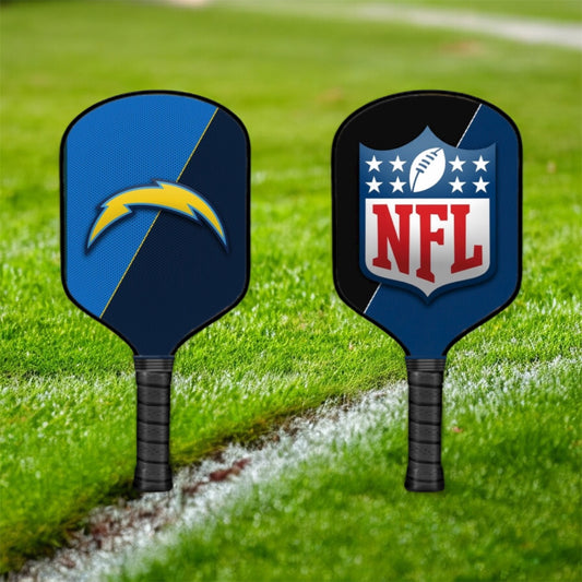 Two pickleball paddles with NFL and Chargers logos on a grass field.