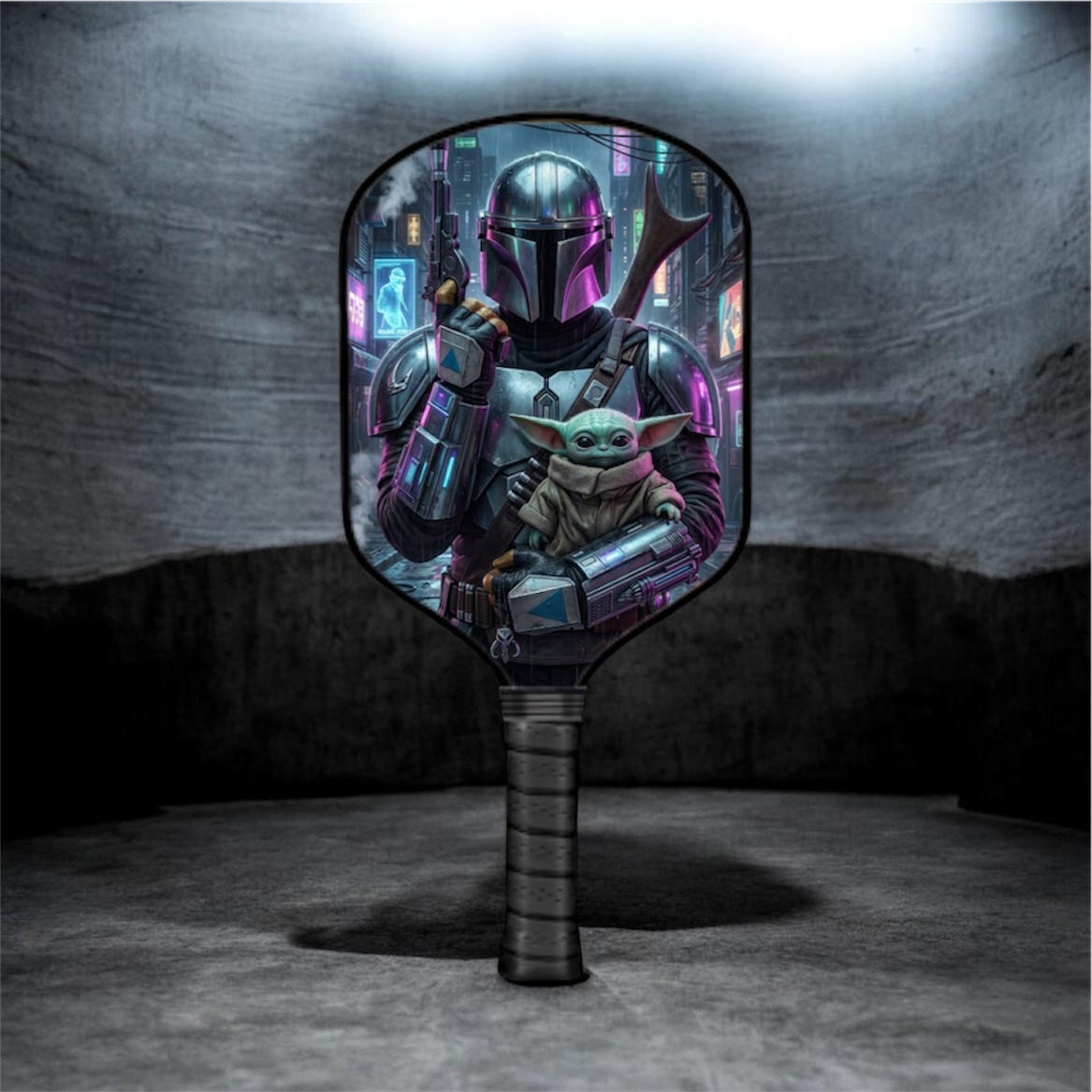 Pickleball paddle with 'The Mandalorian' and Baby Yoda design on a reflective surface.