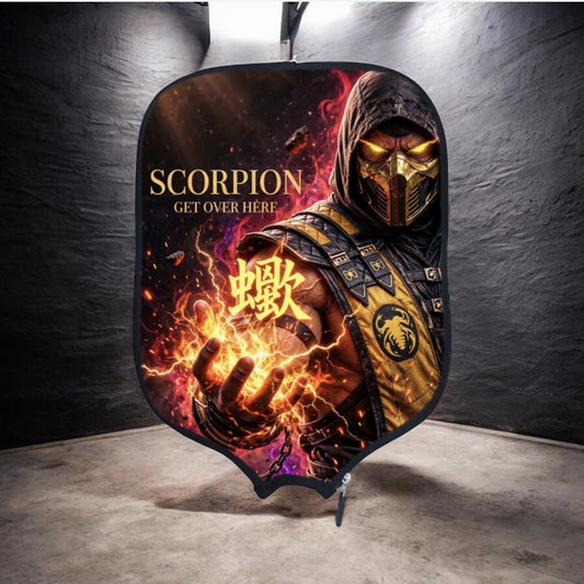 A large printed backdrop banner featuring the character Scorpion from Mortal Kombat, with fiery graphics and the text 'SCORPION GET OVER HERE', displayed in a dark studio corner.