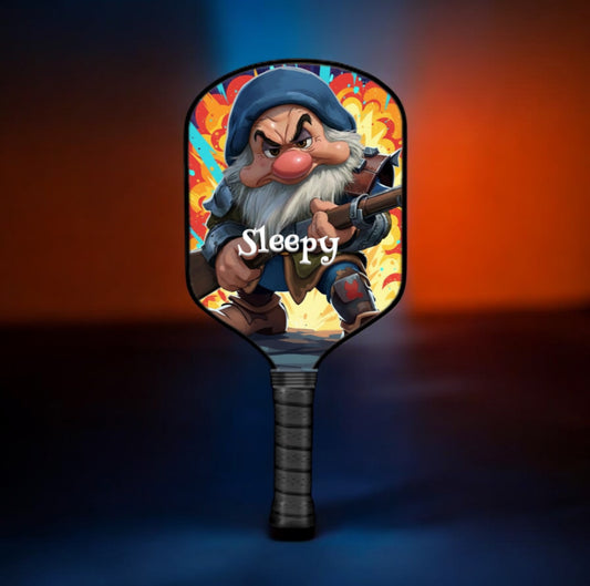 Pickleball paddle with 'Sleepy' character design on a colorful background
