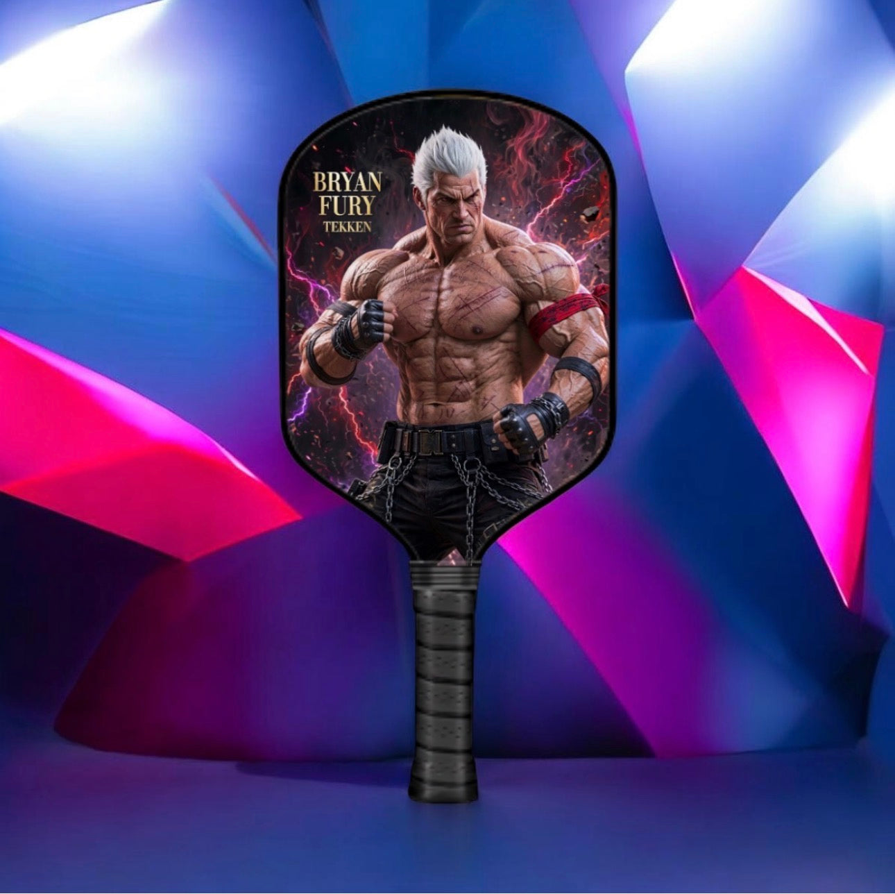 A handheld paddle-style fan or wind spinner featuring a printed graphic of the character Bryan Fury from Tekken on the head and a textured black handle, set against a colorful geometric blue, purple, and pink background.
