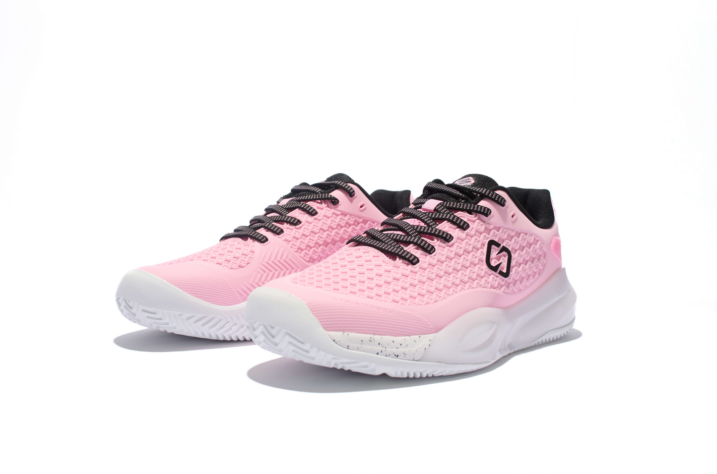 Pink running shoes with black accents on a white background