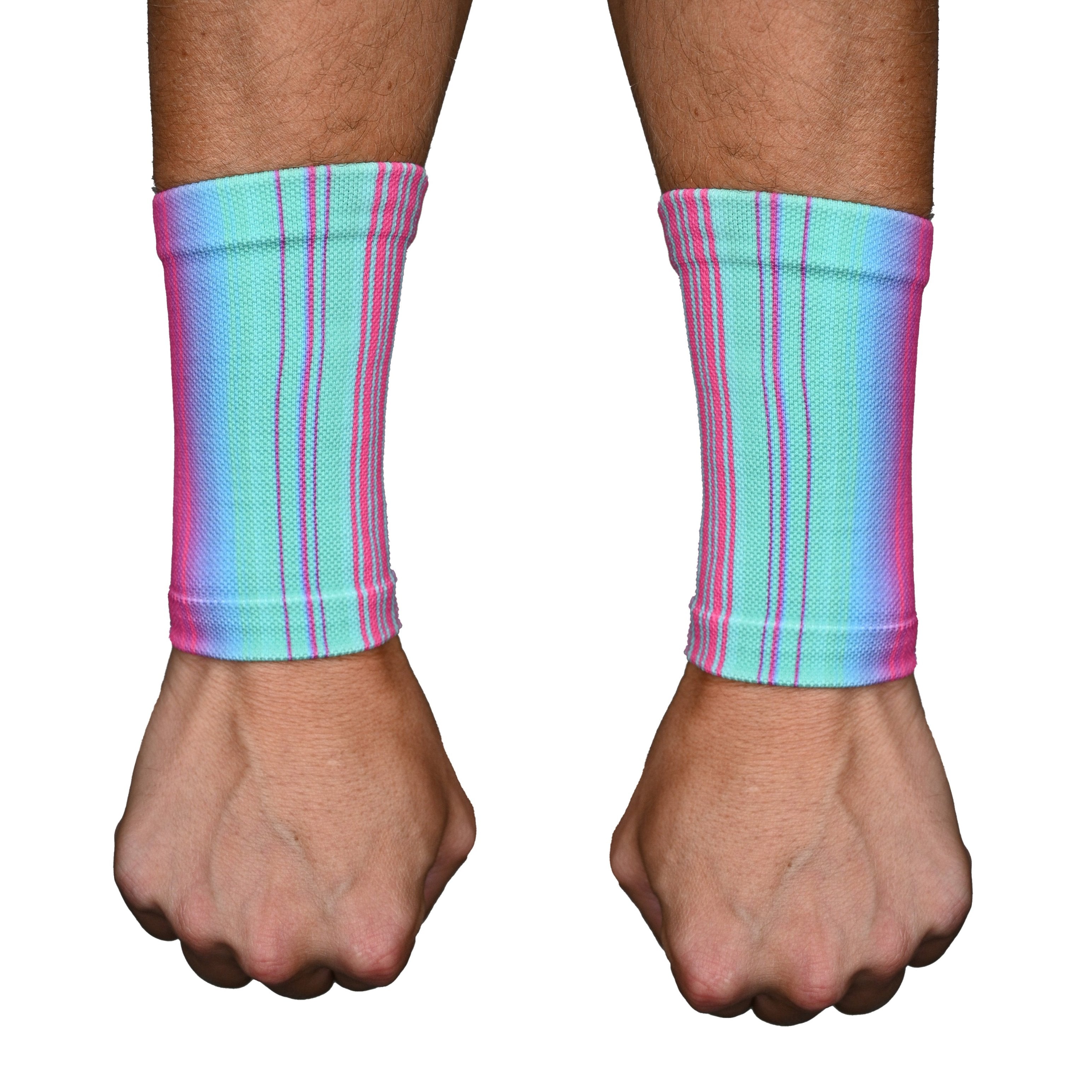 Colorful striped wrist wraps on a person's wrists with a white background