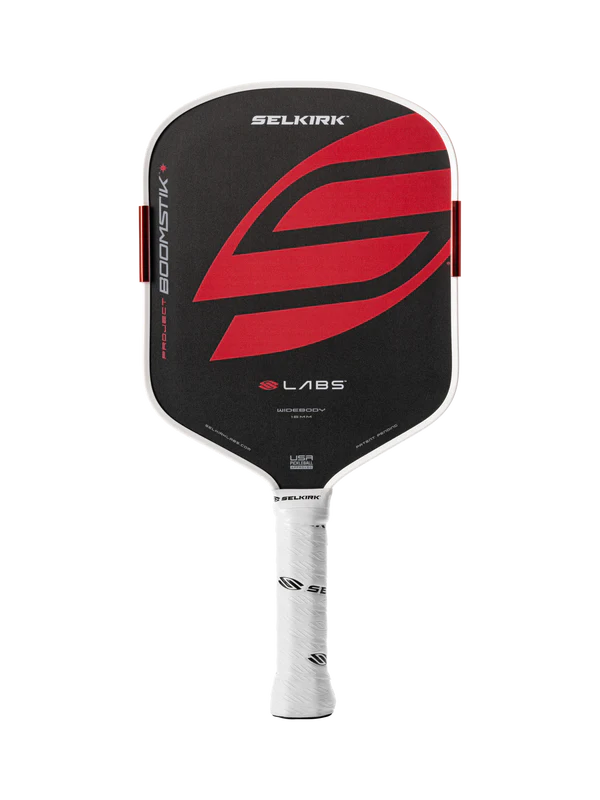 Selkirk pickleball paddle with red and black design on a white background