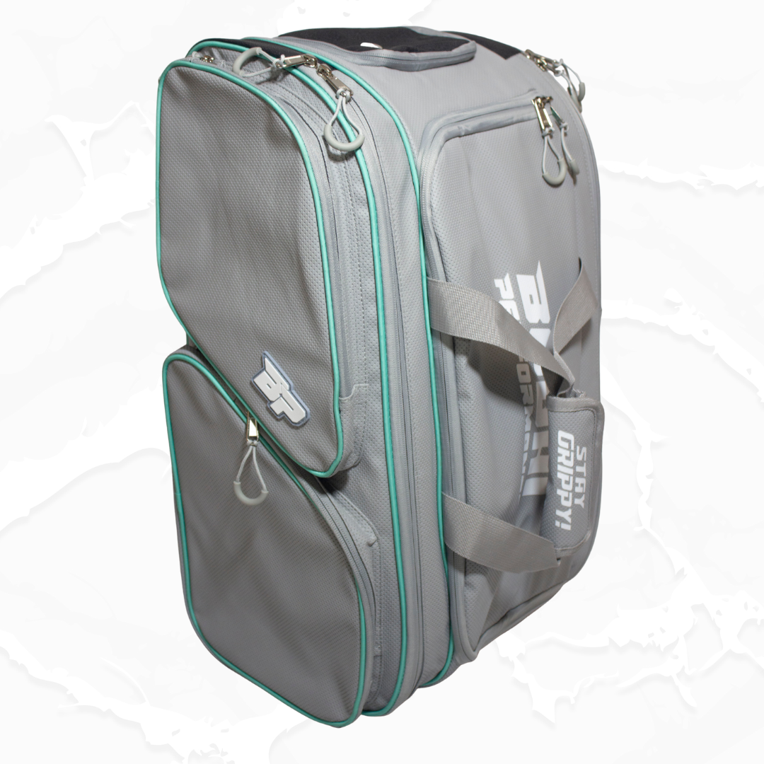 Gray sports bag with green accents on a white background