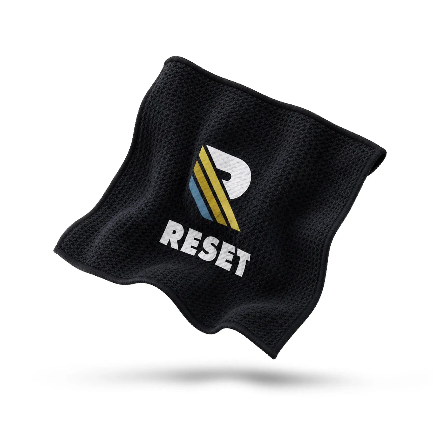 Black towel with 'RESET' logo on a white background